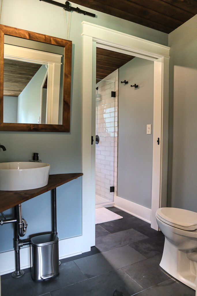 Bathroom vanity with vessel sink and shower at The Wayback vacation rental near Cleveland