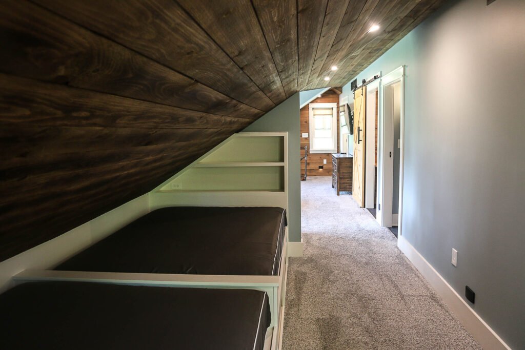 Upstairs sleeping area with built-in beds at The Wayback Cleveland vacation rental near Chagrin Falls
