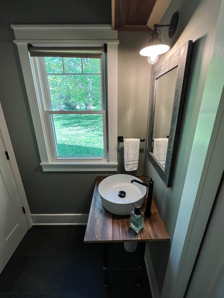 Guest bathroom sink and window at The Wayback Cleveland vacation rental near Chagrin Falls