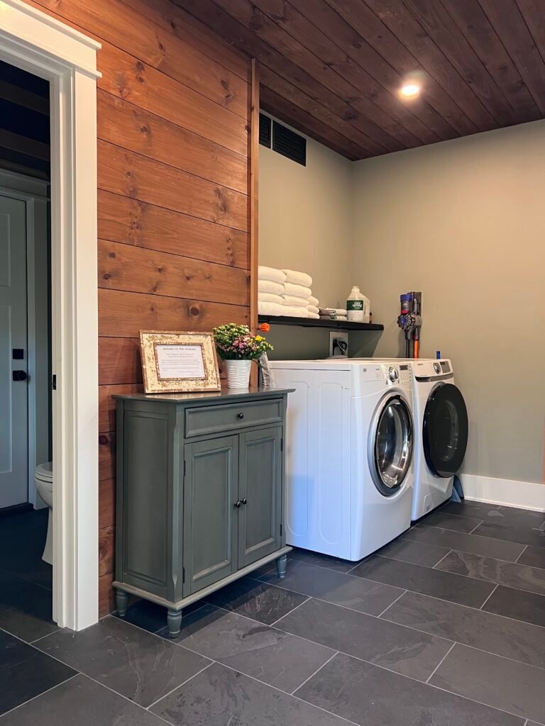 Laundry room with washer dryer and storage at The Wayback guest house near Cleveland